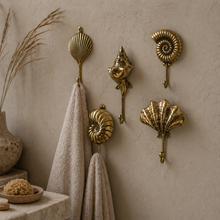 Load image into Gallery viewer, Brass Ammonite Fossil Wall Hook β Coastal Shell Hook, Beach House Bathroom Towel Hanger
