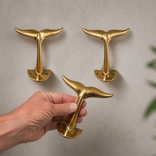 Load image into Gallery viewer, Brass Whale Tail Wall Hook (3 Sizes) β Coastal Bathroom Towel Hook, Nautical Wall Hook, Entryway Coat Hook, Beach House Decor