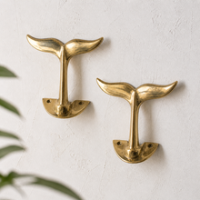 Load image into Gallery viewer, Brass Whale Tail Wall Hook (3 Sizes) β Coastal Bathroom Towel Hook, Nautical Wall Hook, Entryway Coat Hook, Beach House Decor