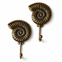 Load image into Gallery viewer, Brass Ammonite Fossil Wall Hook – Coastal Shell Hook, Beach House Bathroom Towel Hanger
