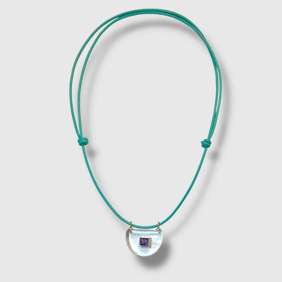 The Invisibles - Crystal Quartz Pendant on Leather